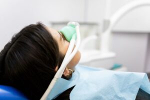 Patient relaxing while wearing nasal mask for nitrous oxide